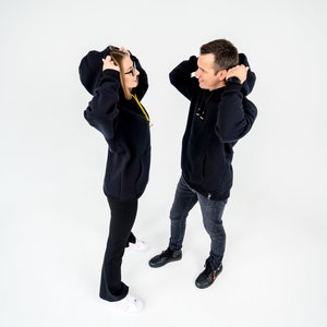 Unisex Oversized Black Hoodie with kangaroo pocket. image 1