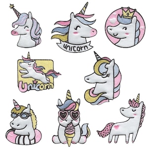 May include: A collection of embroidered unicorn patches in various designs. The patches feature unicorns with colorful manes, horns, and accessories like sunglasses and crowns. Some patches include the word "unicorn".