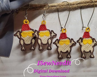 May include: Four pairs of free-standing lace earrings featuring a cartoon turkey wearing a Santa hat and sunglasses. The earrings are displayed on a wooden surface with a gray bow and twine.