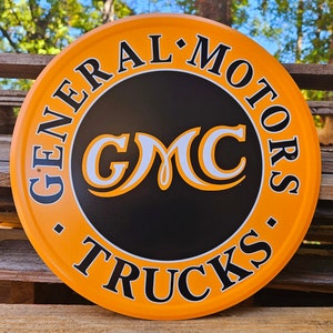 GMC TRUCKS General Motors Round Metal Tin Sign home office garage wall décor USA