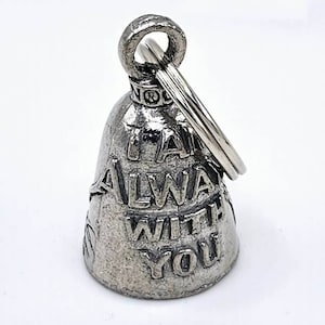 May include: Silver motorcycle bell with a keyring. The bell has the words "I am always with you" engraved on it.