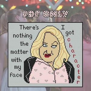 May include: Cross stitch pattern featuring a cartoon character with blonde hair and a pink shirt with hearts. The text reads "There's nothing the matter with my face I got character".