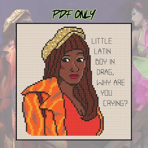 May include: A cross-stitch pattern featuring a portrait of a person in drag, with brown skin, long brown hair, and a gold head wrap. The person is wearing an orange and red outfit. Text reads: "Little Latin Boy in Drag, Why Are You Crying?" The words "PDF ONLY" are at the top.