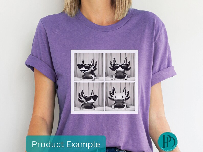 May include: Purple t-shirt with a graphic of four axolotls wearing sunglasses. Each axolotl is in a separate square. The axolotls are black and white.