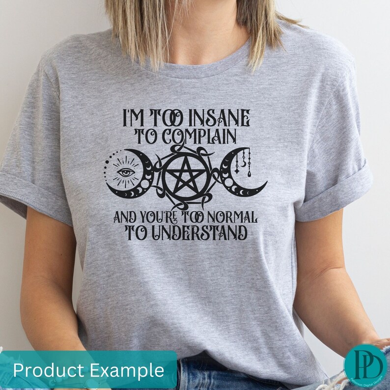 May include: A gray t-shirt with a black graphic print that reads 'I'm too insane to complain and you're too normal to understand.' The graphic also includes a pentagram, a crescent moon, and an eye.
