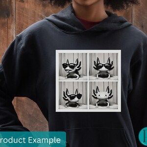 May include: Black and white graphic print of four axolotls wearing sunglasses on a black hoodie. The axolotls are in a grid pattern with each axolotl facing forward.