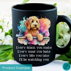 May include: Black ceramic coffee mug with a watercolor illustration of a golden doodle dog peeking over a brick wall. The text "Every snack you make Every meal you bake Every bite you take I'll be watching you" is printed on the mug.