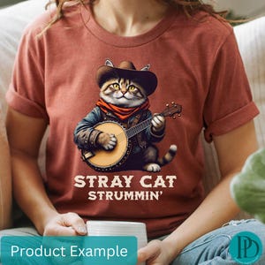 Chat errant Strummin Cowboy Cat jouant du banjo PNG Transparent, Clipart drôle de chat occidental, conception de sublimation de mélomane, art numérique de pays