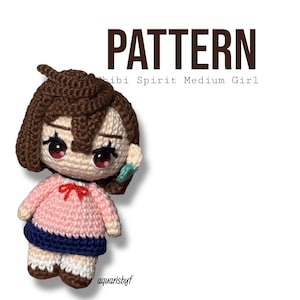 May include: Crocheted doll in the shape of a chibi girl. The doll has brown hair, red eyes, and is wearing a pink sweater with a red bow, a blue skirt, and brown shoes. The word "PATTERN" is at the top of the image.