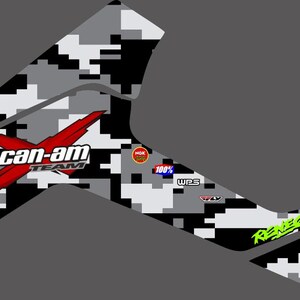 May include: Black and white camouflage graphic design with the text "can-am team" in red and "Renegade" in green. The design also includes the text "100% WPS" and "NOK 100%"