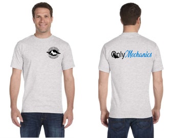 May include: A gray t-shirt with a black and white graphic on the front and the text "Only Mechanics" in blue on the back.