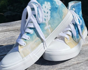 Sneakers with handmade botanical cyanotype with real leaves and flowers.