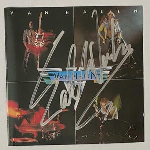Autografo di Eddie Van Halen sulla copertina del CD di Van Halen Inc COA