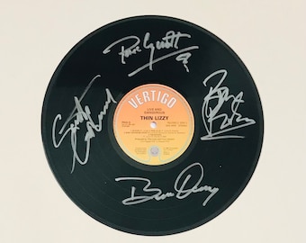 Disque d'affichage en vinyle LP dédicacé par Thin Lizzy