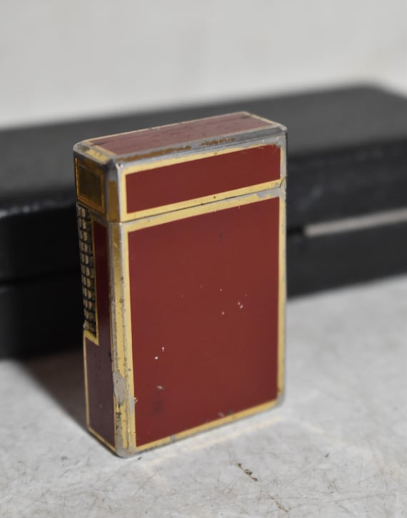 Vintage Gold Marked Japan Lighter 2 3/4” Tall By Under 1