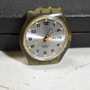 Swatch Swiss AG 2005 Quartz Wristwatch – Transparent Case, Silver Dial, Day-Date, Swiss Made-Watch Wristwatch Jewel Jewelry Accessory