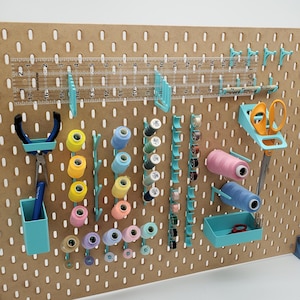 skadis pegboard sewing accessories for thread and bobbins