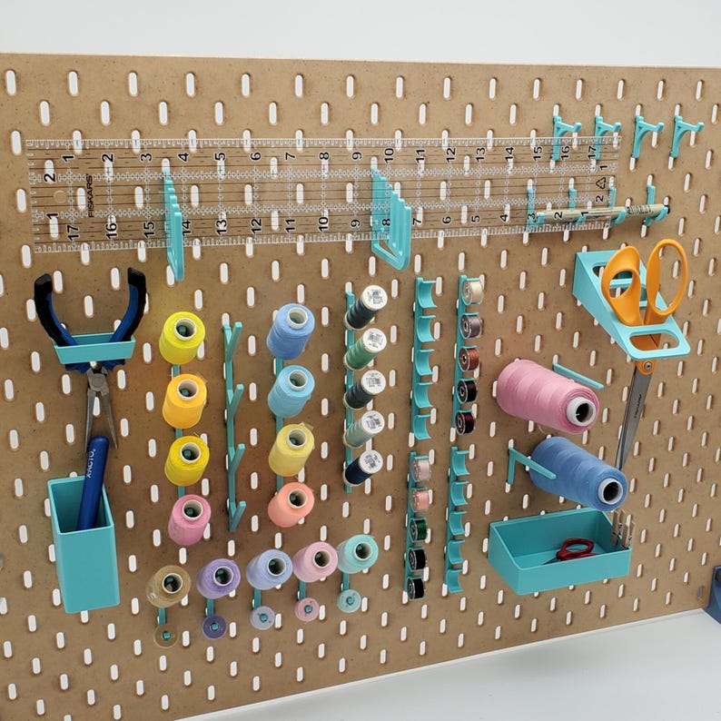 skadis pegboard sewing accessories for thread and bobbins