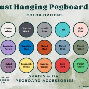 May include: A graphic showing color options for pegboards. The colors include cotton white, charcoal black, fossil gray, teal, light pink, lavender purple, sapphire blue, muted red, muted blue, muted green, muted purple, savannah yellow, sunrise orange, lava red, and forest green. The text "Just Hanging Pegboards" and "SKADIS & 1/4" PEGBOARD ACCESSORIES" is also included.
