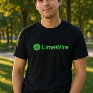May include: Black crew neck t-shirt with the LimeWire logo in green. The logo features a green segmented circle and the word "LimeWire" in a matching green font. The person is standing outside with a green background.