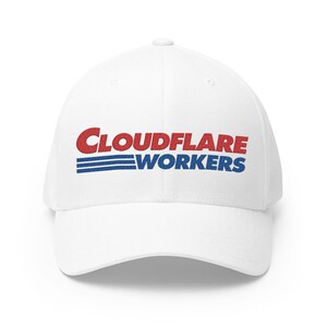 May include: A white baseball cap with the words "CLOUDFLARE WORKERS" embroidered in red and blue. The text is centered on the front of the cap, with the word "CLOUDFLARE" in red above the word "WORKERS" in blue.