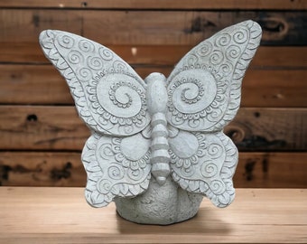 Concrete butterfly on stone figure Sitting butterfly on rock figure Garden backyard or patio sculpture