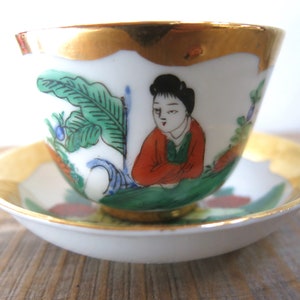 Vintage Oriental tea cup and saucer with golden accents | Chinese cup and saucer |  Hand-painted porcelain cup and saucer