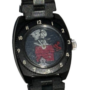 Vintage RARE Original Snoopy and the Red Barron Flying Ace Watch Licensed in 1965 American Syndicate Peanuts. Red Biplane and Cloud Rotates