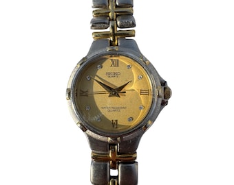 Vintage Seiko damklocka tvåfärgad kvarts från 1980-talet 8y21-0020
