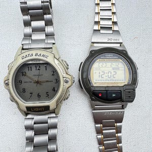 Lot of 2 Vintage Casio Digital Watches - Voice Memo A-V3 and Casio ABX-24 Data Bank - Vintage Store Closeout Lot