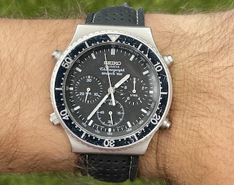 SEIKO SPORTS 70 ブラックダイヤル Vintage 1980s Seiko Sports 100 Men's Black Watch 7A28-7049