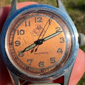 Vintage Muralt Mechanical Hand Wind Bronze Colored Dial Swiss Watch Runs 17 jewels