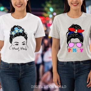 May include: Two white t-shirts with a black and white illustration of a woman with a messy bun and the text "Proud Pinay" and "Pinay" on each shirt.