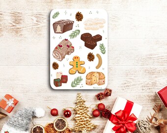 Może przedstawiać: Biała arkusz naklejek z ilustracjami różnych świątecznych smakołyków, w tym piernikowego ludzika, rolady, panettone i ciasta czekoladowego. Arkusz naklejek zawiera również gałązki sosny, szyszki i gwiazdki.