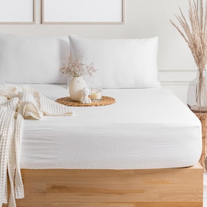 white bed sheets