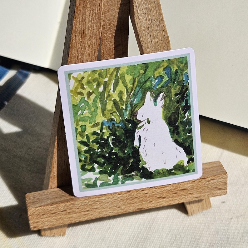 May include: A watercolor painting of a white dog sitting in a green leafy forest. The dog is facing away from the viewer and has its head turned to the side. The painting is on a white background.