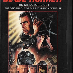 May include: A VHS tape cover for the movie Blade Runner: The Director's Cut, featuring Harrison Ford, Rutger Hauer, Sean Young, Edward James Olmos, and Daryl Hannah. The cover features a futuristic cityscape with a flying car and a large, circular structure.