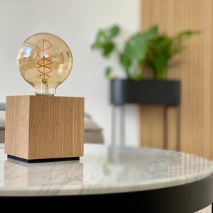 modern premium Edison table lamp made of solid oak wood with textile cable and G80 LED light bulb