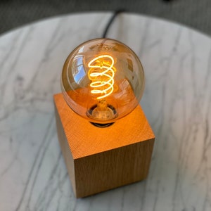 modern Edison table lamp made of solid oak wood with dimmer, plastic or textile cable