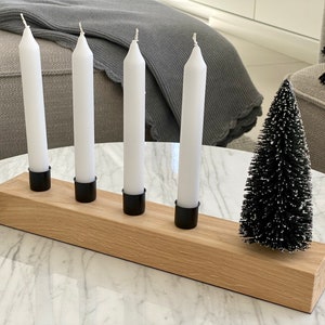 Advent wreath made of oak and black matt candle holders