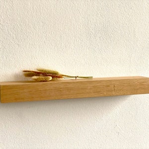 schwebendes Wandregal massiv Eiche Holz Wandboard Bilderleiste Ablage