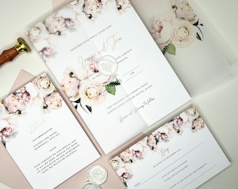 May include: A wedding invitation suite with a floral design. The invitation features a white background with pink and white flowers. The text on the invitation reads "Together with their loved ones, Jouse and Tom, request the pleasure of your company at their wedding".