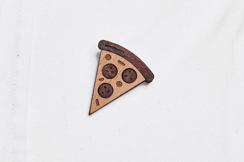 Piece of pizza as a pin, badge, brooch made of wood for a celebration or festival image 1