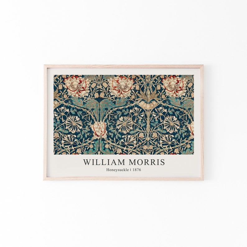 May include: A framed print of a vintage floral pattern in shades of blue, green, and gold. The print features a repeating design of stylized flowers and leaves. The text "WILLIAM MORRIS Honeysuckle 1876" is printed below the image.