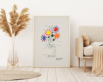 May include: A framed print of a colorful line drawing of a bouquet of flowers. The flowers are red, orange, yellow, blue, and green. The drawing is signed "Picasso".