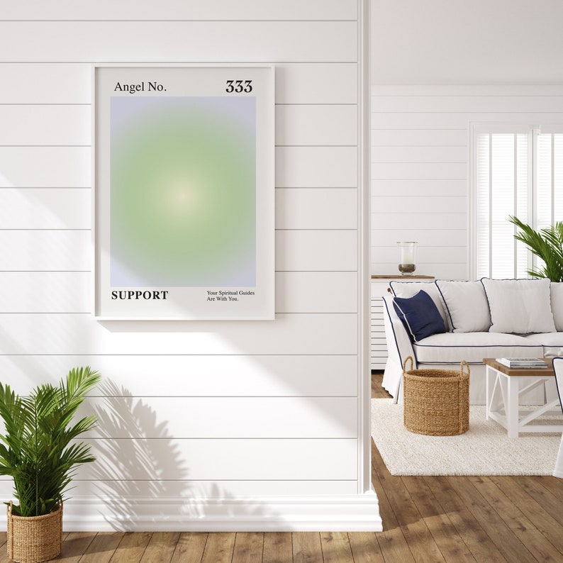 May include: A white framed poster with a light green and purple gradient background. The poster has the text "Angel No. 333" at the top and "SUPPORT" at the bottom. The text "Your Spiritual Guides Are With You" is in smaller font below the word "SUPPORT".
