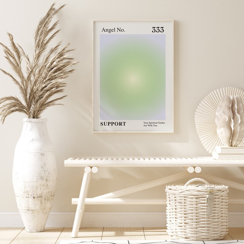 May include: A white framed poster with a green and purple gradient background. The poster has the text "Angel No. 333" at the top and "SUPPORT" at the bottom. The text "Your Spiritual Guides Are With You." is in smaller font below "SUPPORT".