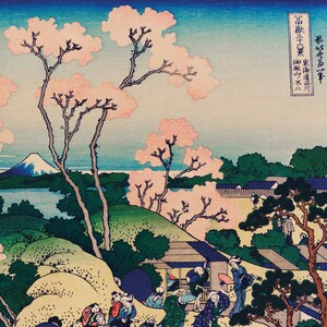 May include: A Japanese woodblock print depicting a landscape scene with a mountain in the background, cherry blossoms in the foreground, and people walking along a path. The print is titled "桜花爛漫", which translates to "Cherry Blossoms in Full Bloom".