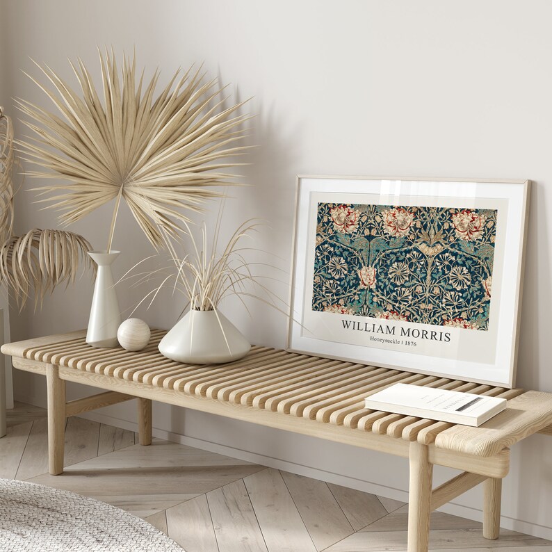 May include: A framed print of a vintage floral pattern in shades of blue, red, and green. The print is titled "William Morris, Honeysuckle 1876".