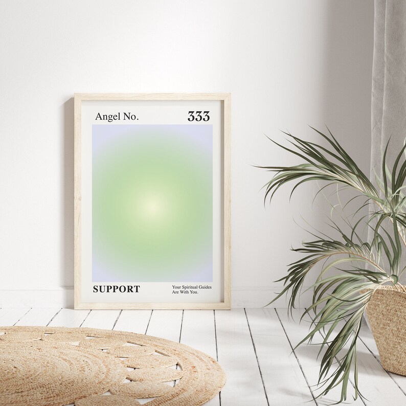 May include: A framed poster with a light green and purple gradient background. The poster has the text "Angel No. 333 SUPPORT Your Spiritual Guides Are With You."